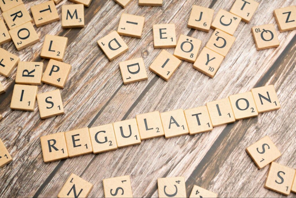 An image showing us the words 'regulation', this image is relevant to our understanding of the regulatory landscape in the AI space. An image showing us the words 'regulation', this image is relevant to our understanding of the regulatory landscape in the AI space.