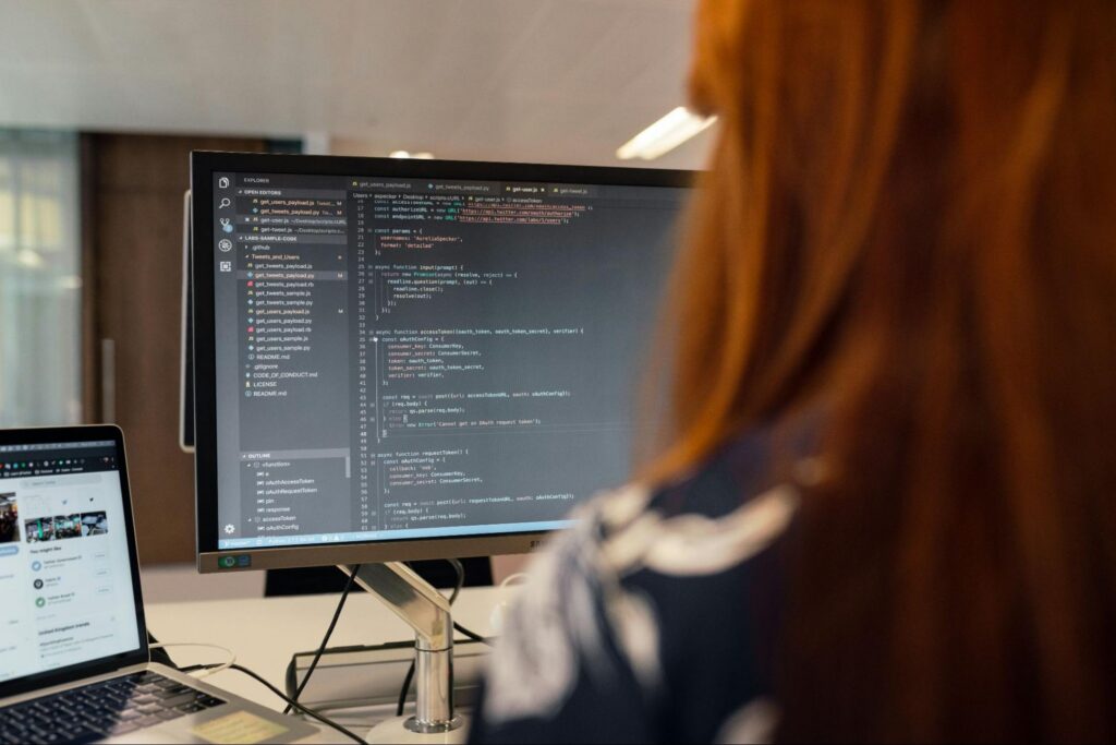 image of a developer sitting at her desk validates the point we're making about accountability failing when context Is missing. image of a developer sitting at her desk validates the point we're making about accountability failing when context Is missing.