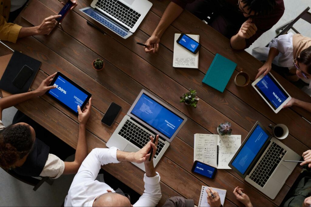 conceptual image of a corporate IT working together on an office image. conceptual image of a corporate IT working together on an office image.