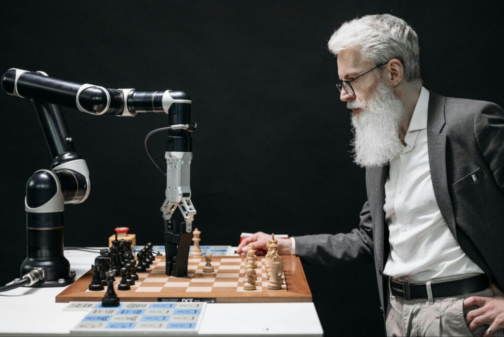 A conceptual image of a man playing chess with AI. A conceptual image of a man playing chess with AI.